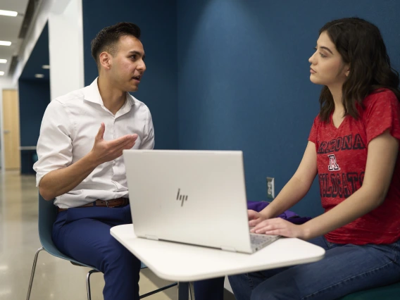 A professional advising a student.