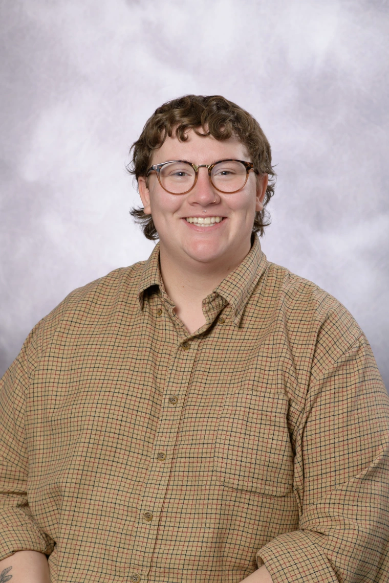 A headshot of a person.