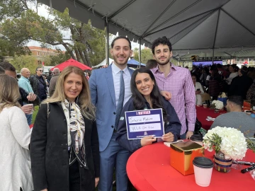 Ziad Hindosh (blue suit) poses with his match