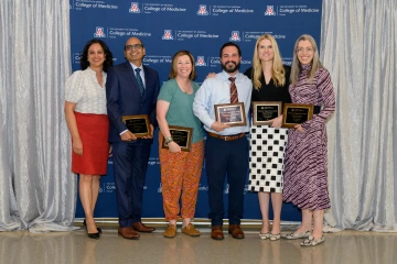 Dr. Cohen and other faculty pose with their awards